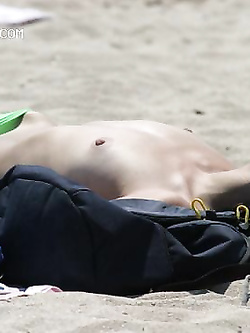 Foto Voyeur esibizioniste in spiaggia