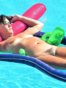 Mature wife naked in the pool